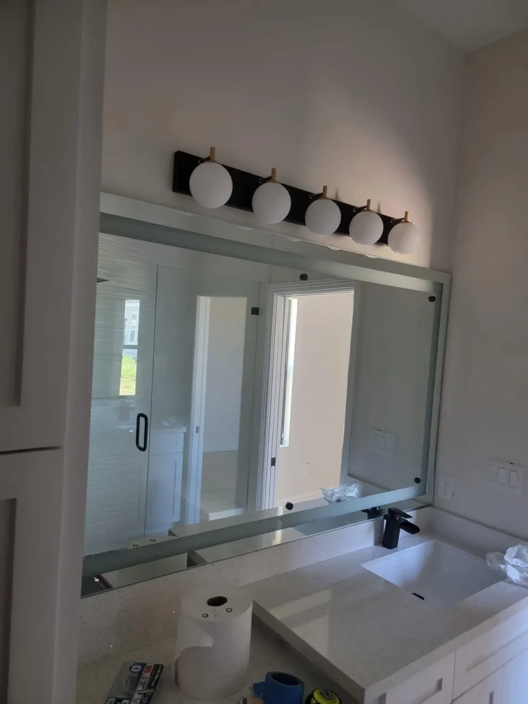 Bathroom vanity mirror installed by USA GLASS