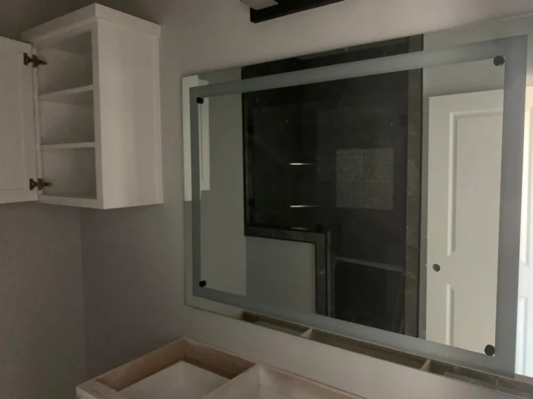 Custom framed wall mirror installed by USA GLASS